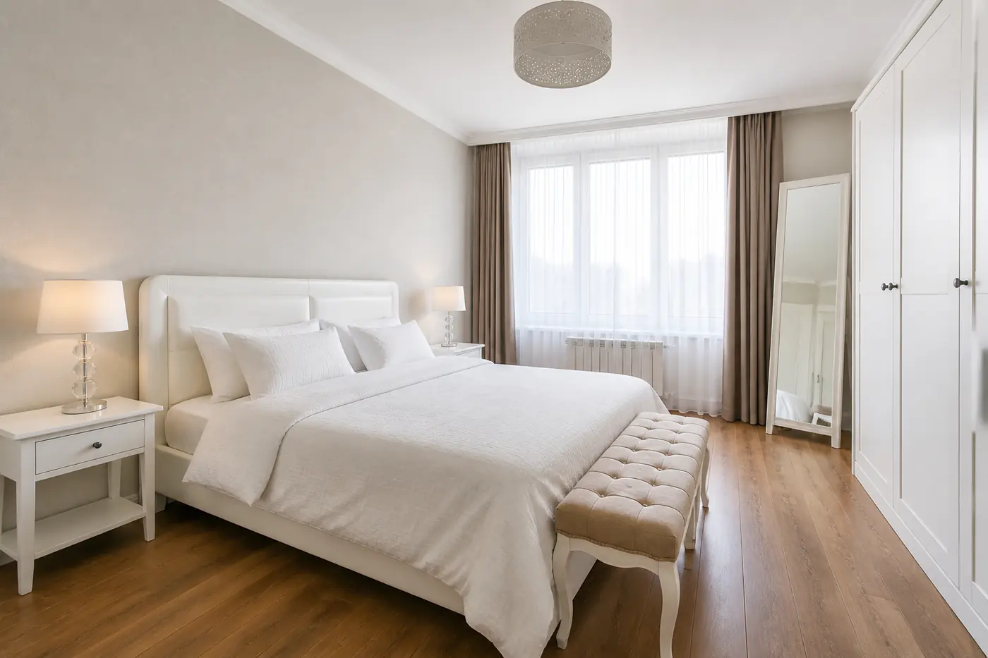 Modern bedroom in a Batumi apartment showing cleaning zones